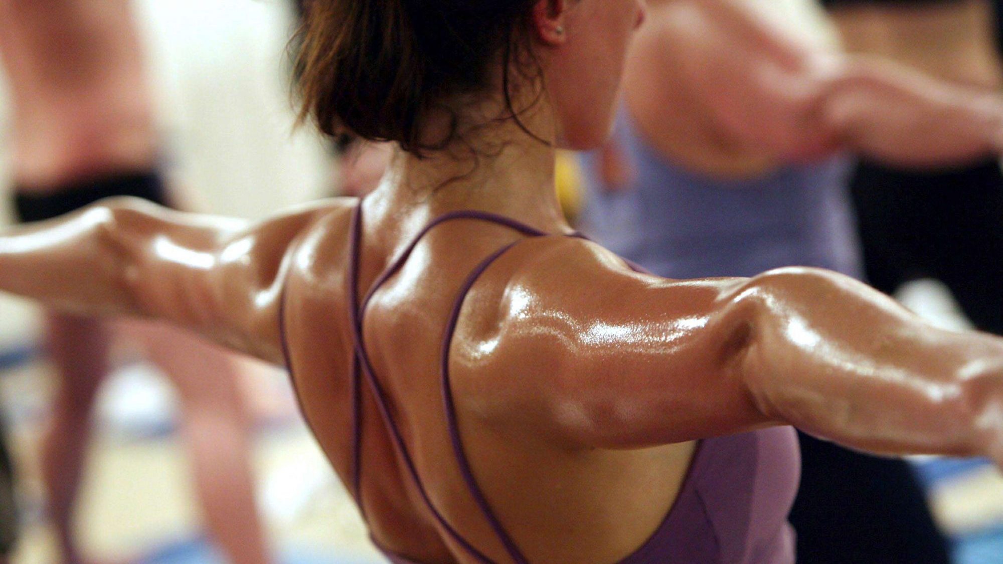 Students Practice The Unique Bikram Yoga